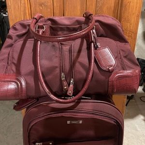 Tumi carry-on and shoulder bag set